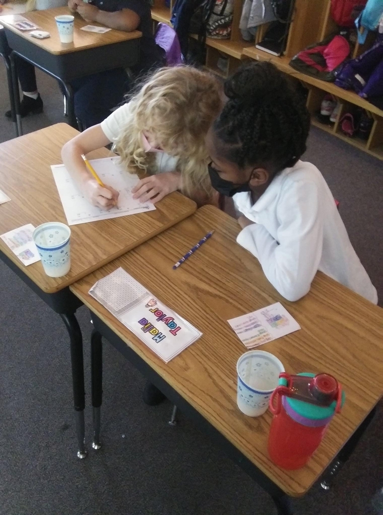 Two students writing