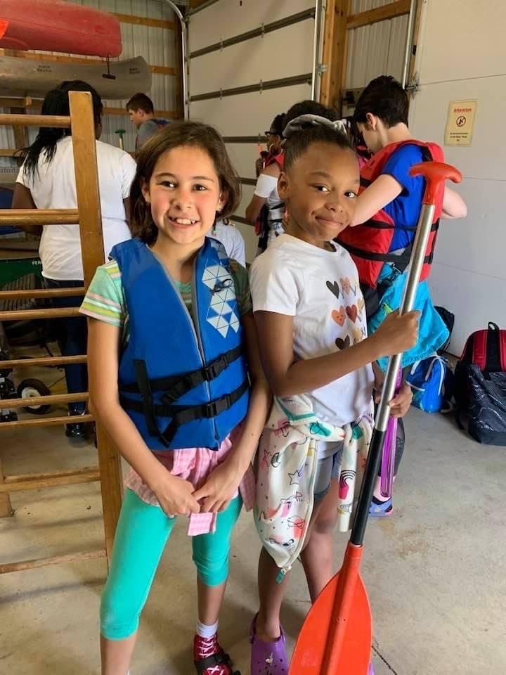 students ready to canoe