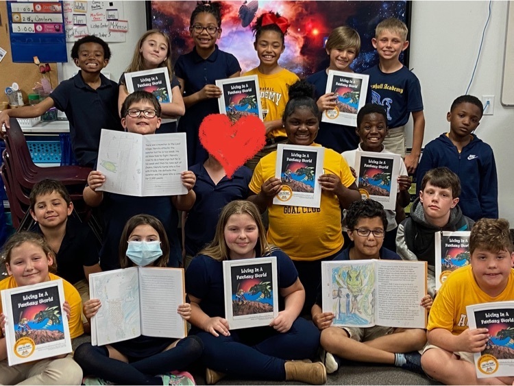 3rd grade class with their book